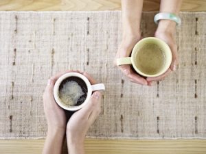 two people having coffee.